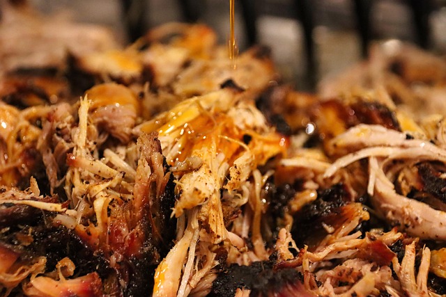 An image of pulled pork coated in barbecue sauce